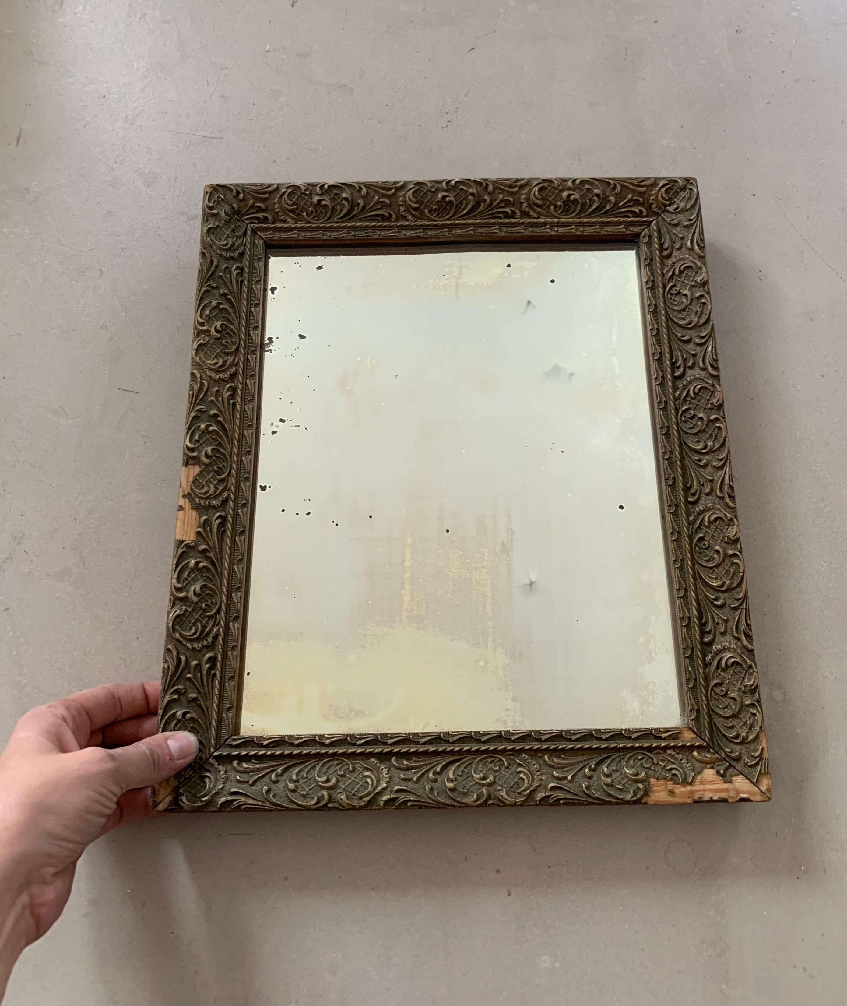 Old stitched golden mirror