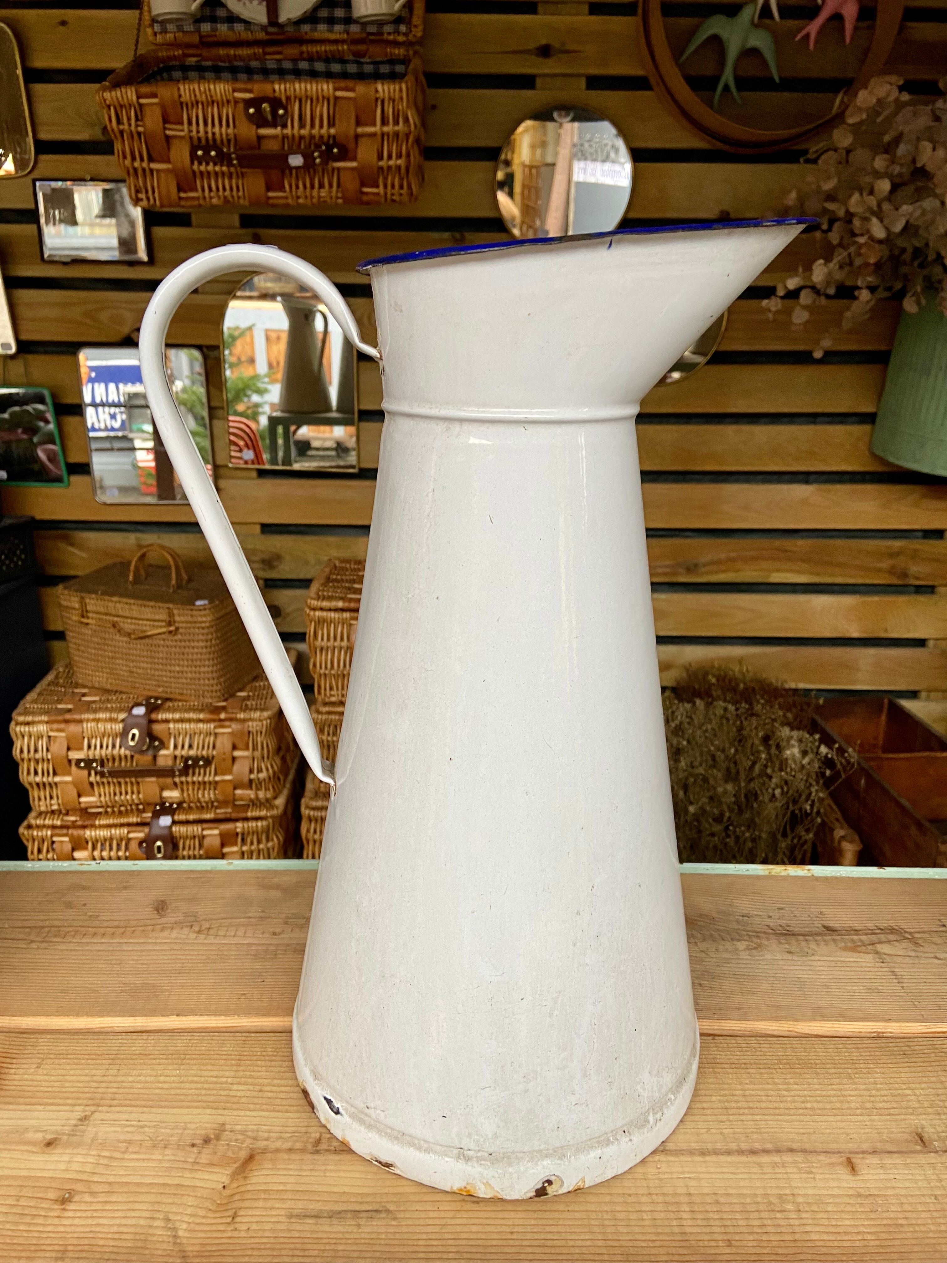 White enamelled pitcher