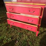 Matte gold and red patinated chest of drawers