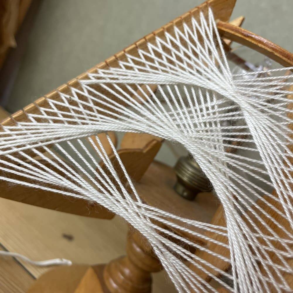 Geometric wood and string-art table lamp