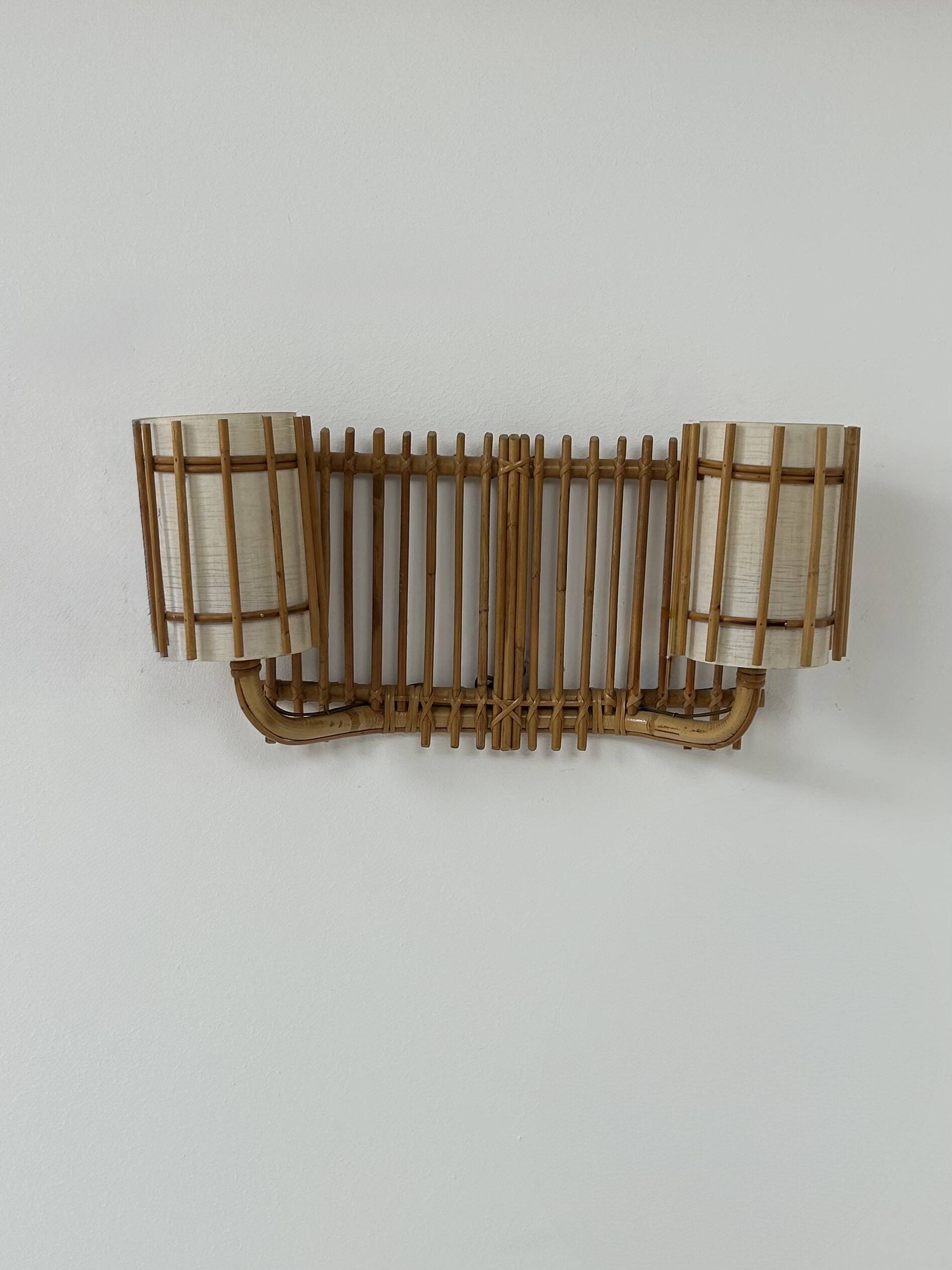 Double vintage wall light in rattan, France, 1950.