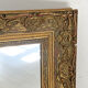 Small old mirror in gilded wood