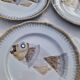 Set of 9 Saint Amand flat plates with fish decor