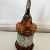 Oil lamp in amber glass, early twentieth century