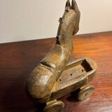 Cheval art populaire en bois sculpté