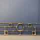 Architectural brutalist wall mounted sculpture made from cast metal.