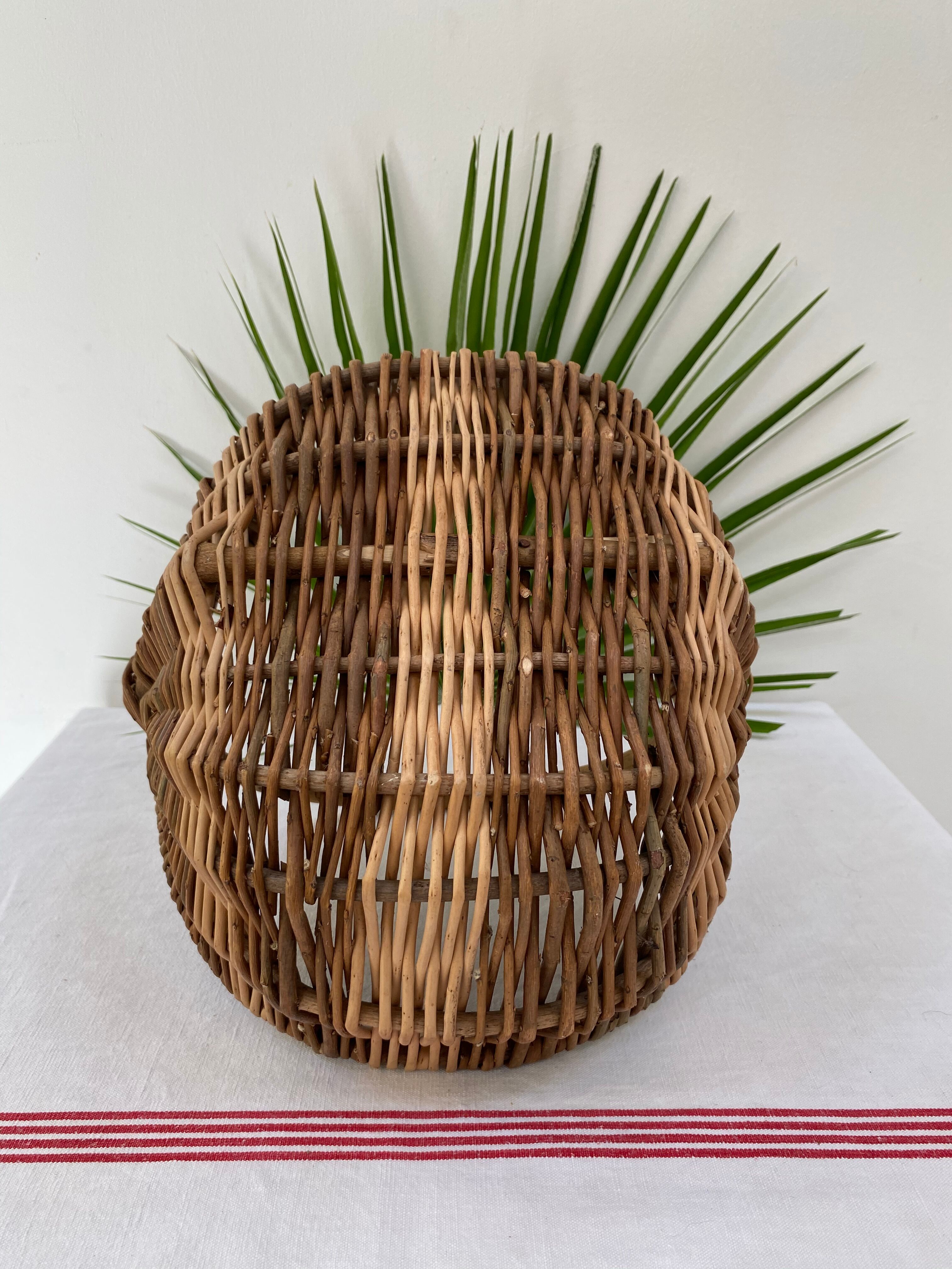 Old handmade basket in woven wicker