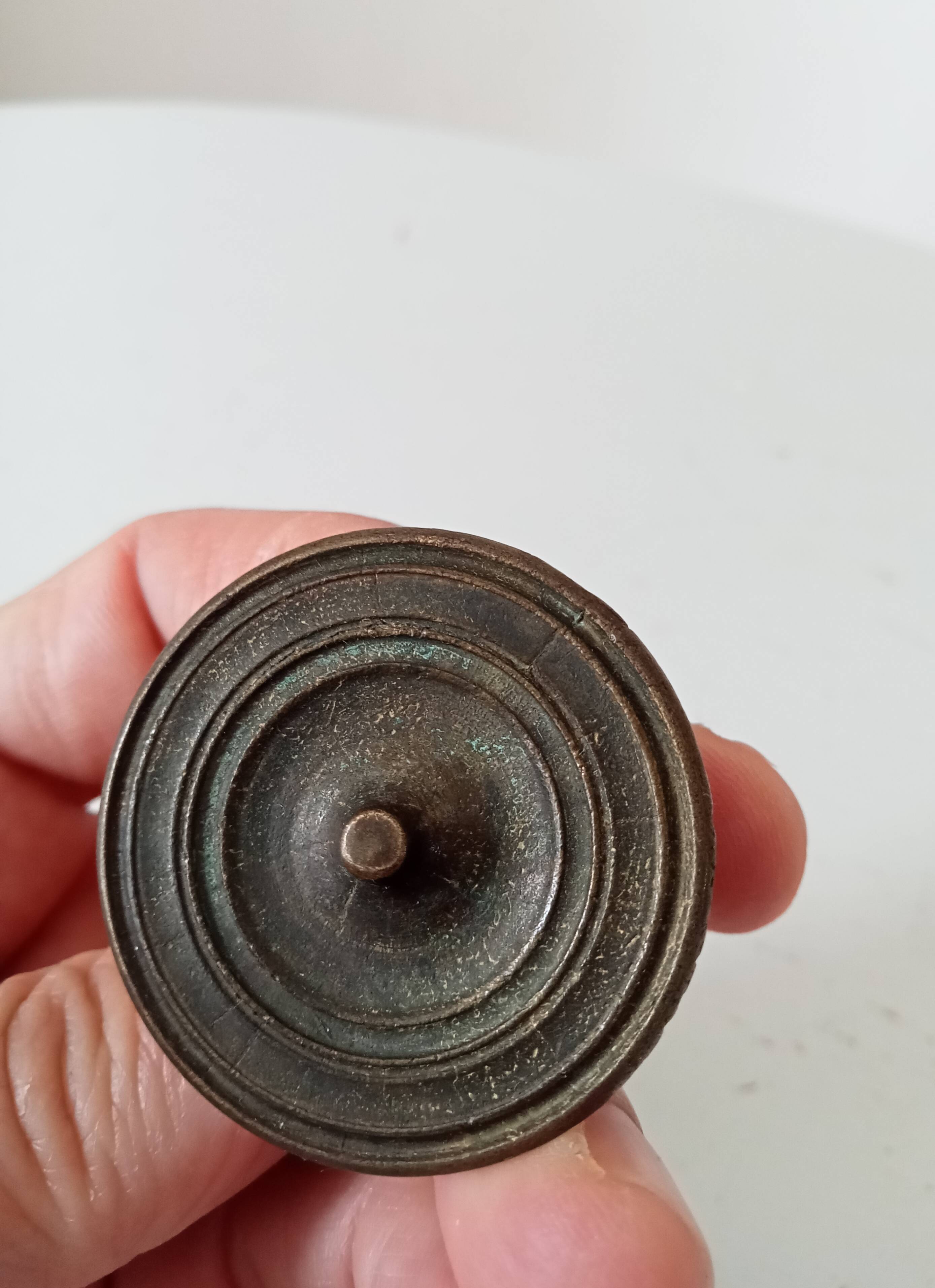 Pair of antique Empire furniture knobs from the 19th century.