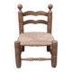 Low chair called fireplace or corner of the fire brutalist art