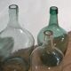 Antique colored demijohns (c.1920). Set of 3 pieces