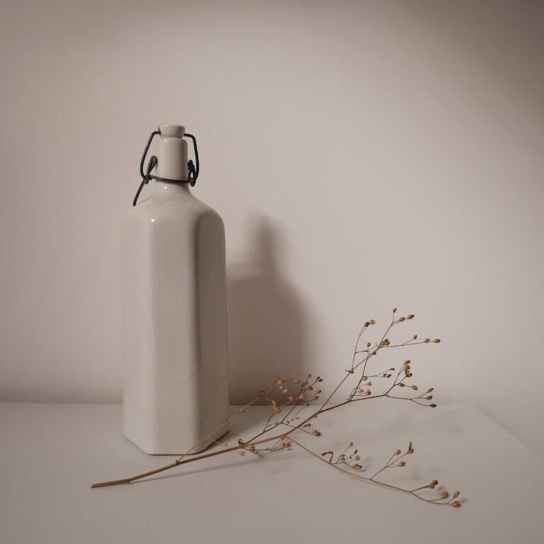 Old stoneware hot water bottle or bottle