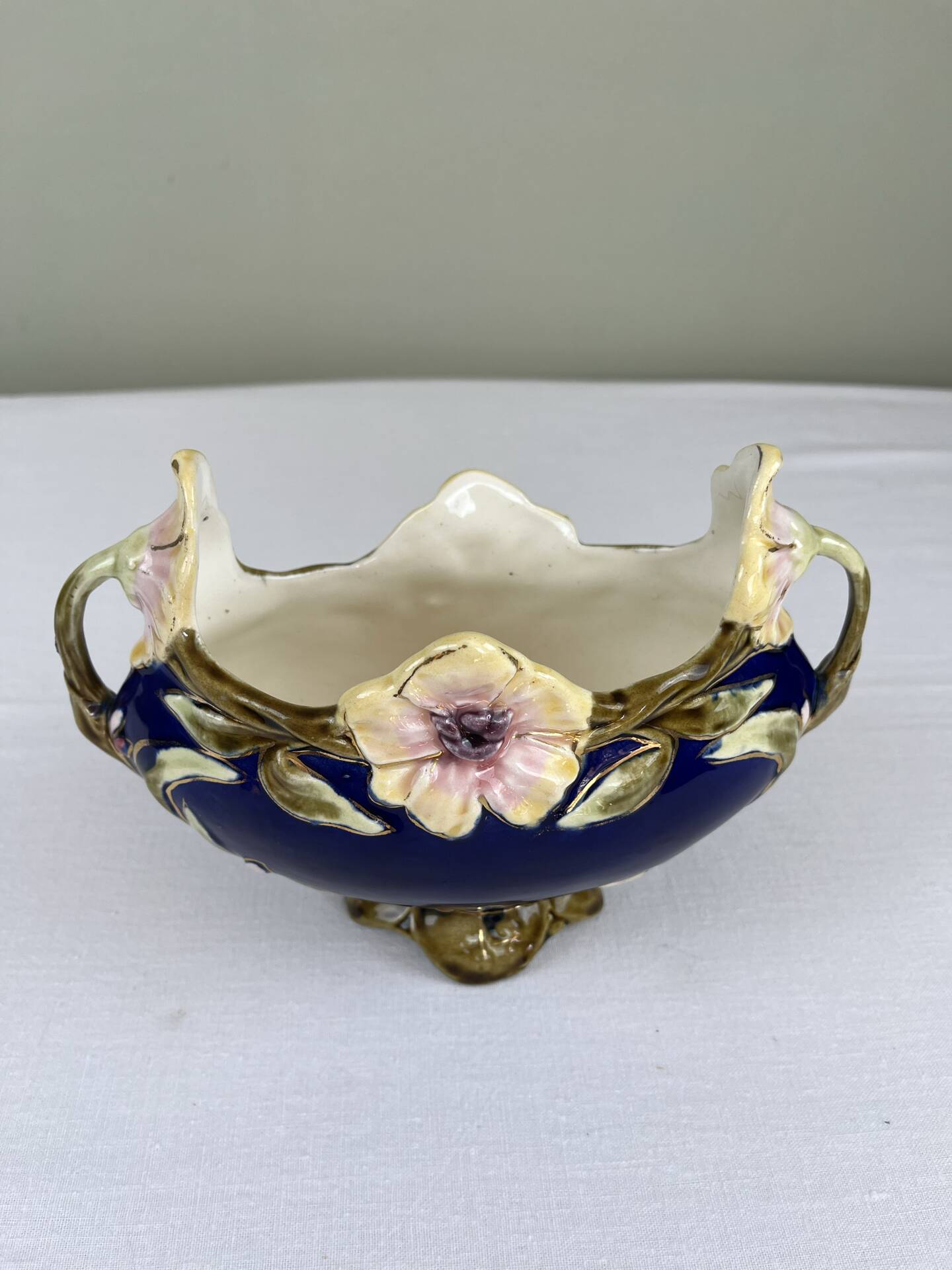 Art Nouveau navy blue barbotine bowl with raised floral decoration
