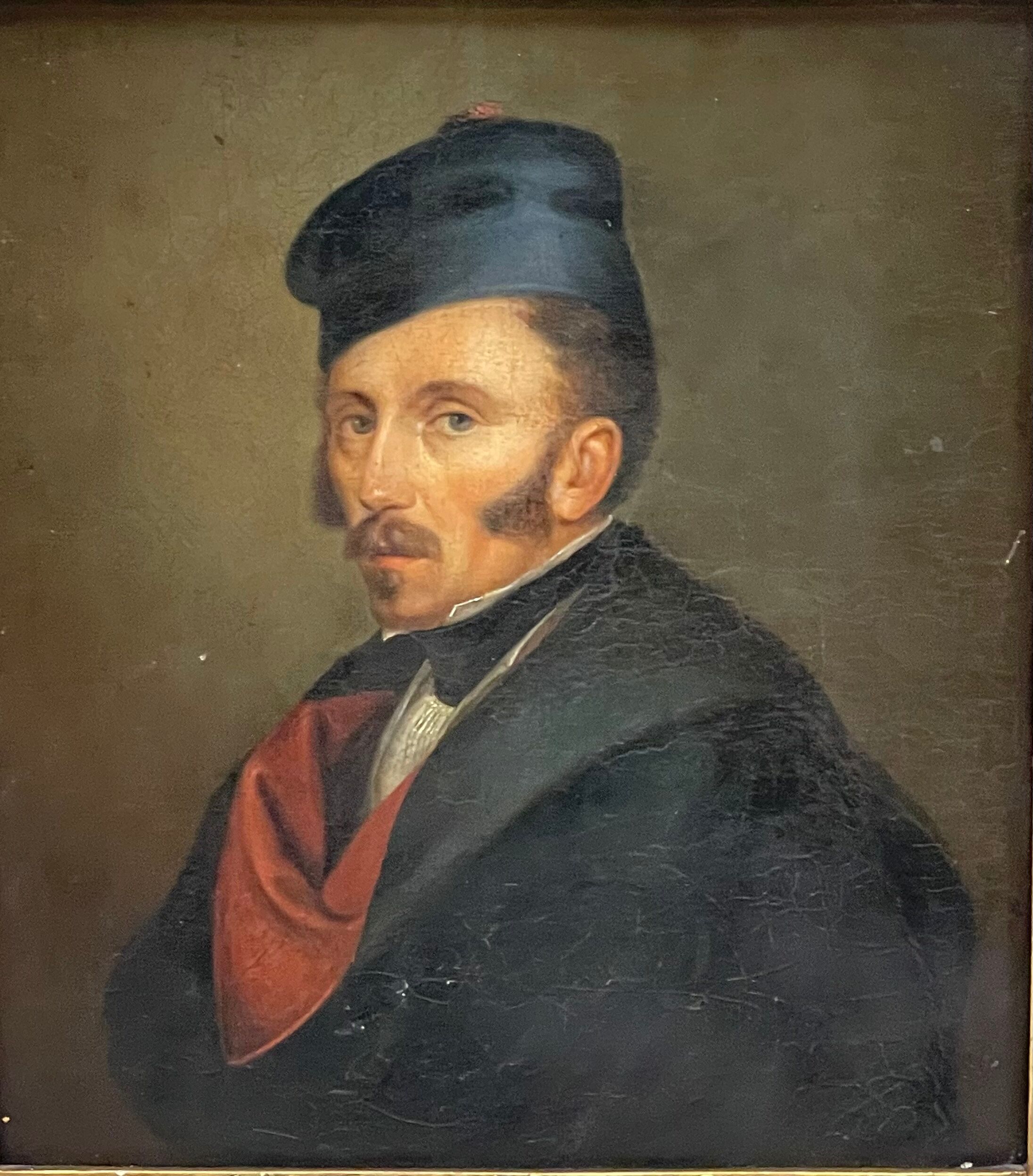 Portrait of a man with a rouflaquettes