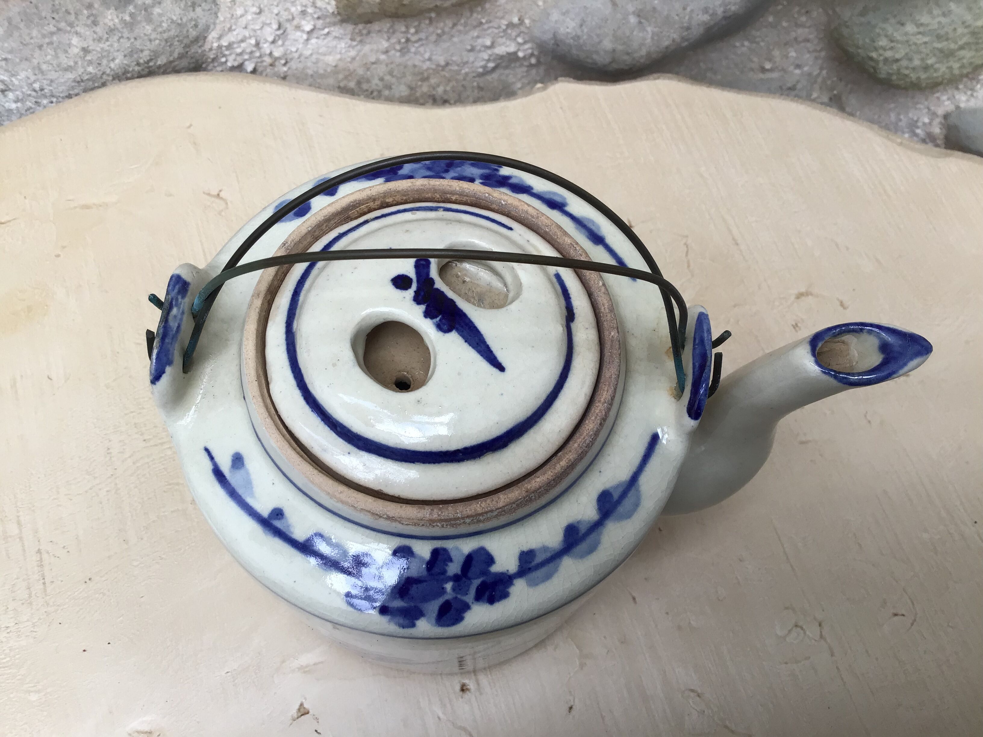 Beige and blue teapot
