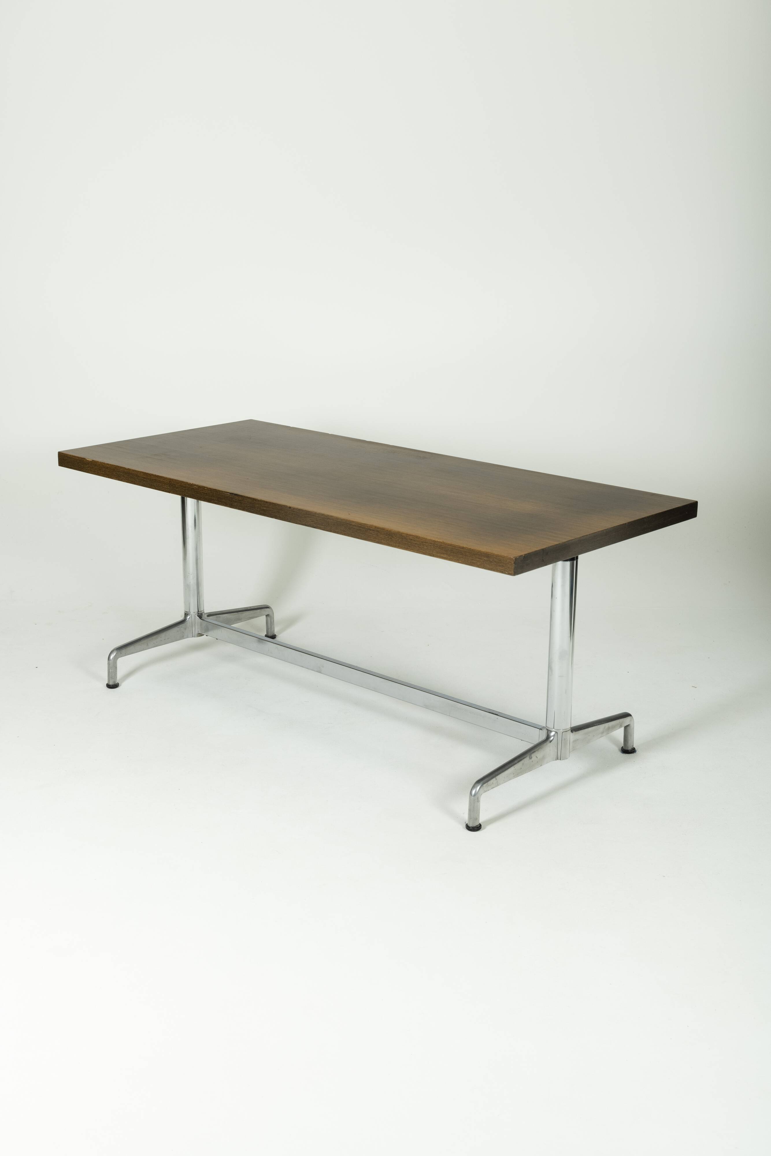 Rosewood table by Giancarlo Piretti for Castelli