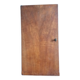 Old door with a bronze handle