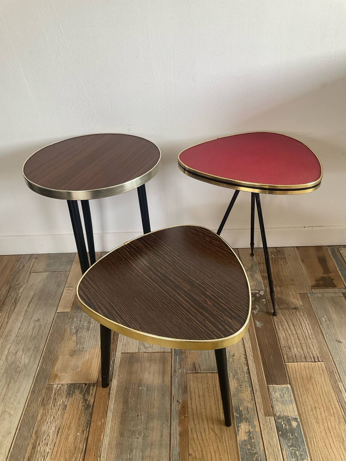 Trio of tripod side tables, 1960s-70s