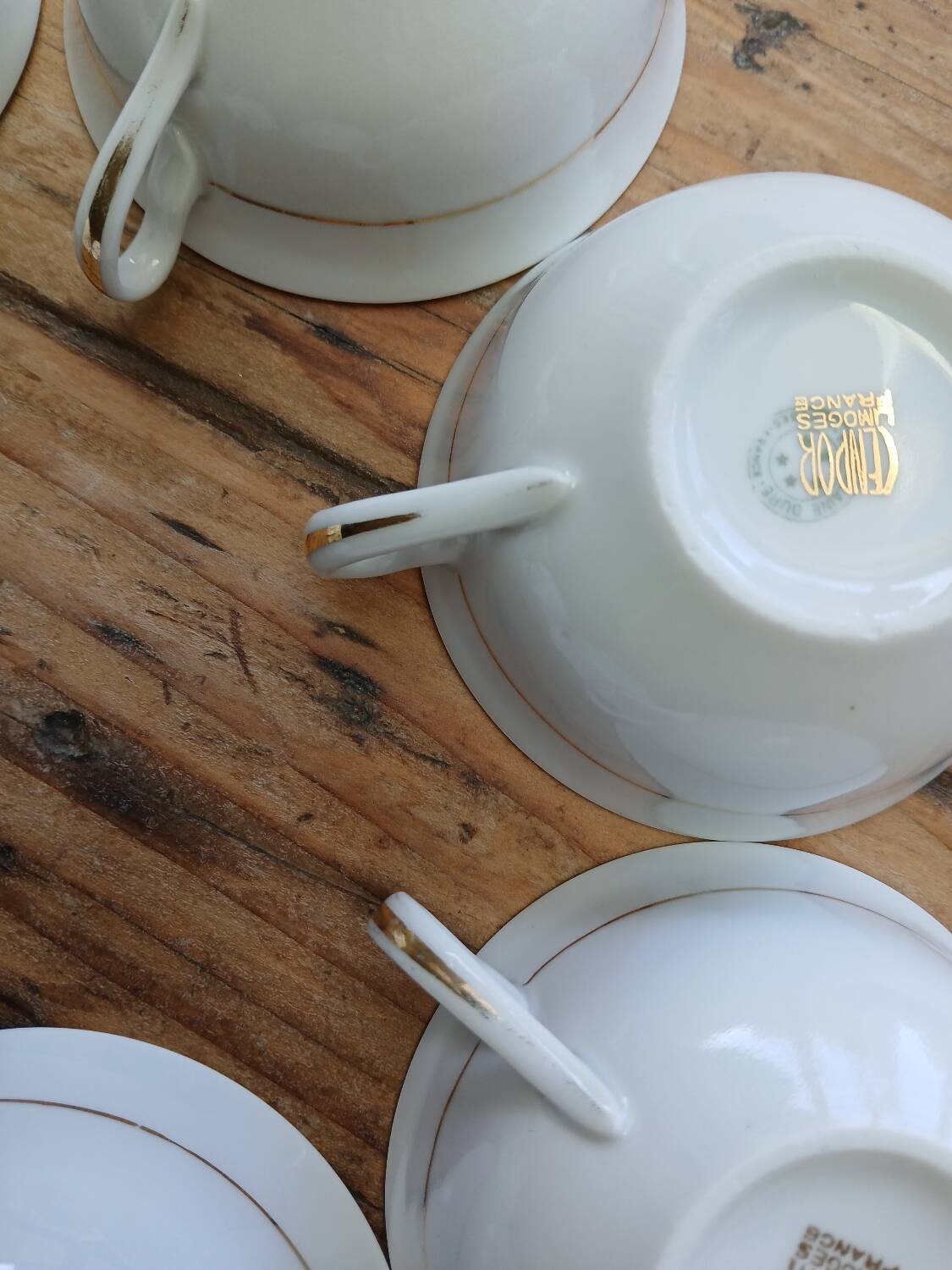 Set of 7 Limoges porcelain cups and saucers