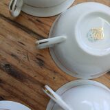 Set of 7 Limoges porcelain cups and saucers