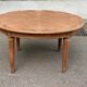 Table de salle à manger ronde extensible signée Jansen Paris 1930
