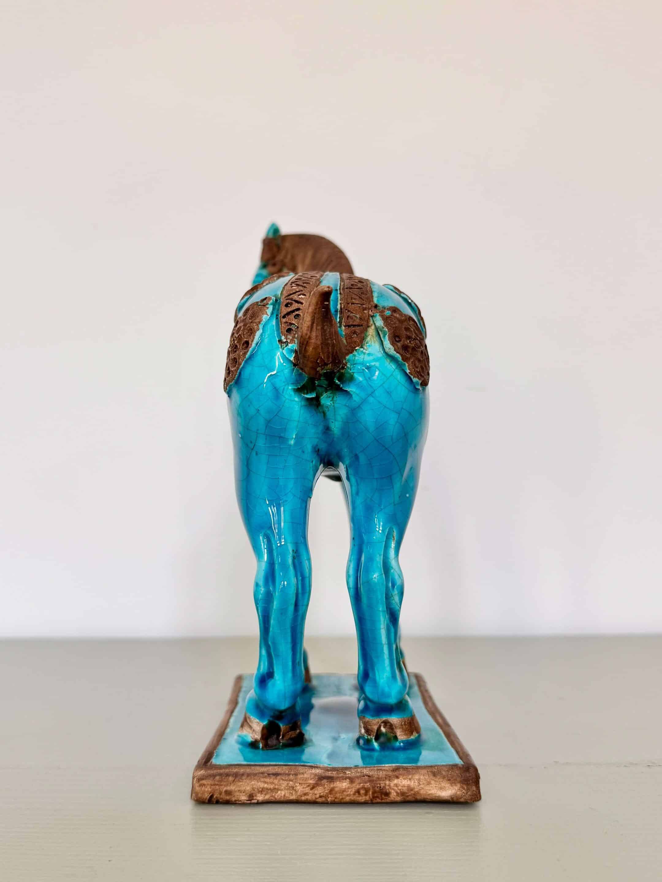 Sculpture of a Tang horse in turquoise blue earthenware