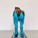 Sculpture of a Tang horse in turquoise blue earthenware