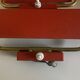 Pair of modernist swivel wall lights in red sheet metal, 1950s