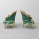 Pair of Louis XV style gilded armchairs with vintage green fabric