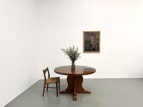 Brutalist round table in solid oak, 1960s.