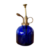 Glass and gold metal spray