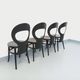 Set of 4 vintage Mouette chairs by Baumann in black wood from the 1960s.