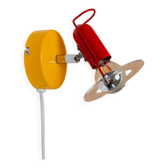 Vintage Paulmann 1980s wall lamp in yellow metal with red head and clear acrylic disc