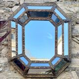 Mirror with parecloses