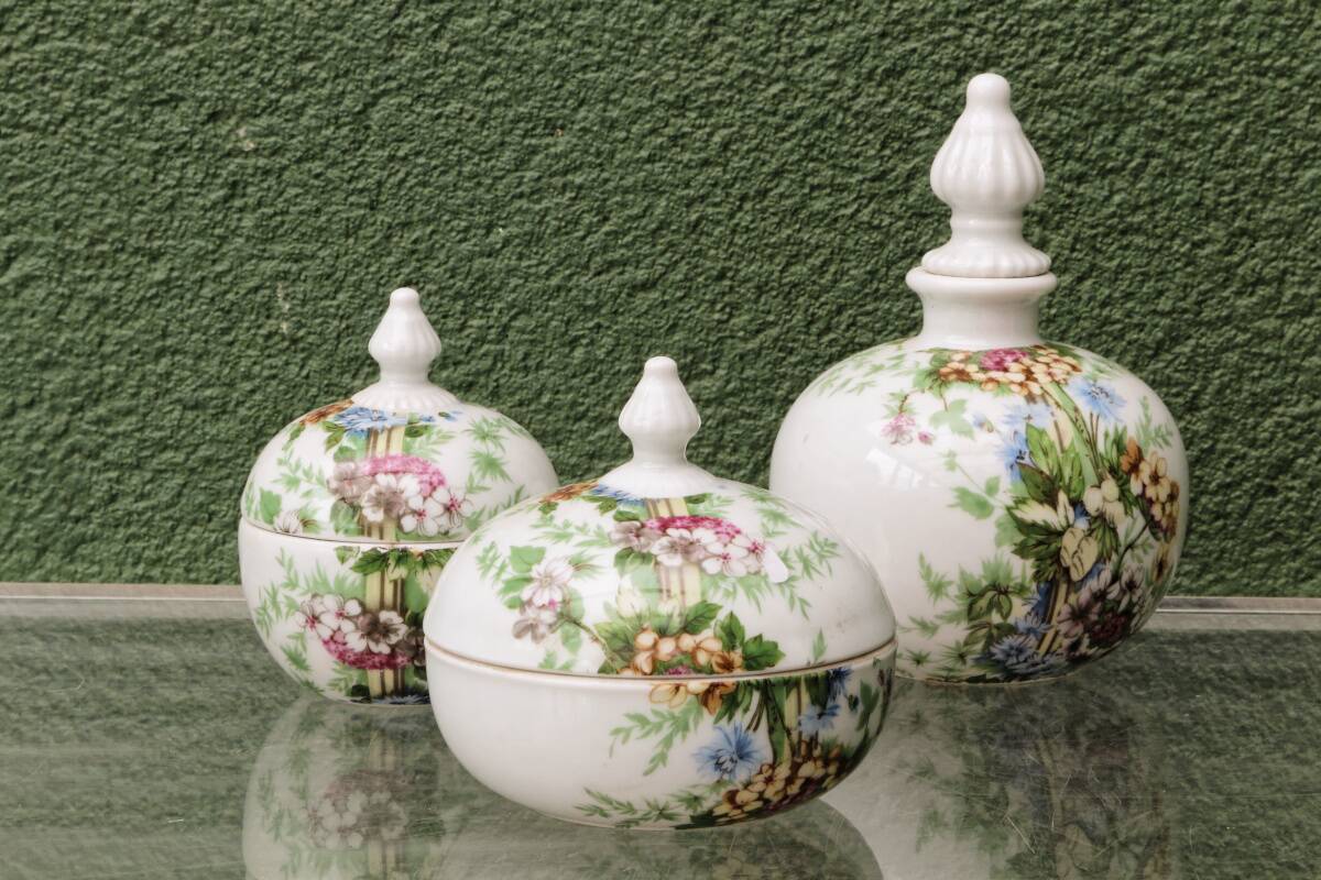 Set of 3 floral porcelain sweet jars from Paris.