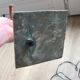 old lamp with stone base and copper arm