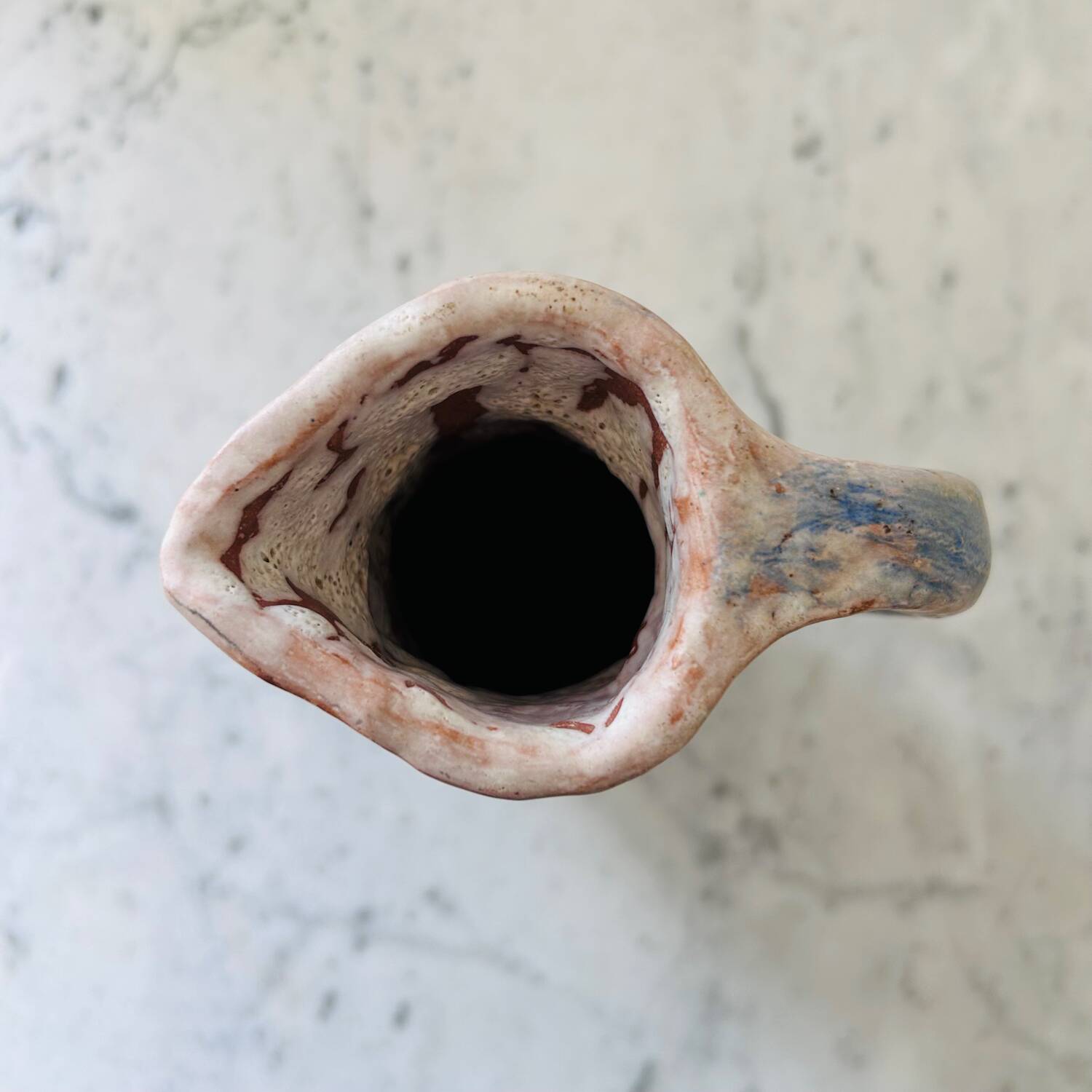 Set of artisanal pitcher and weathered cups