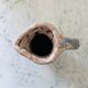 Set of artisanal pitcher and weathered cups
