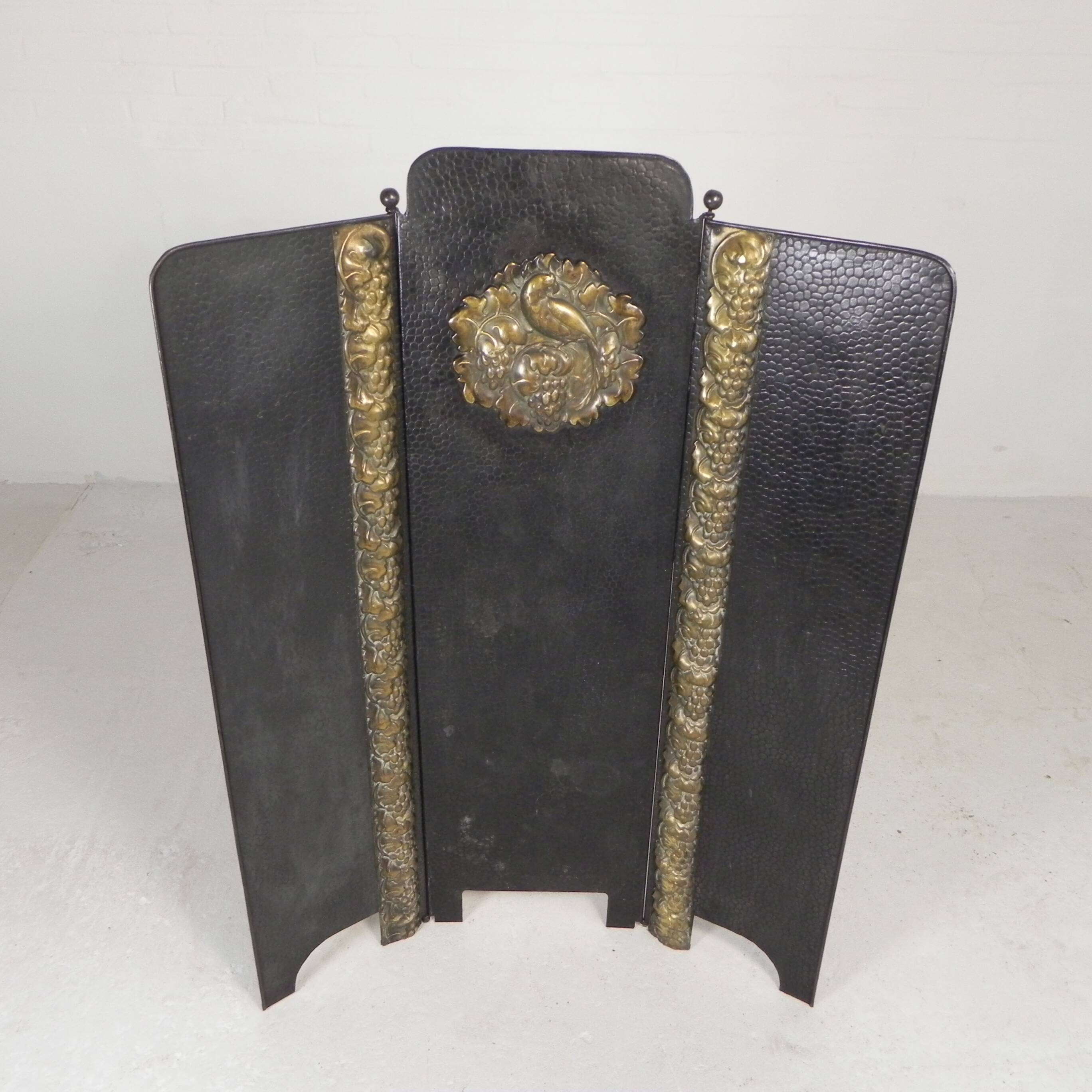 Art Deco screen in steel with brass details, 1930s.