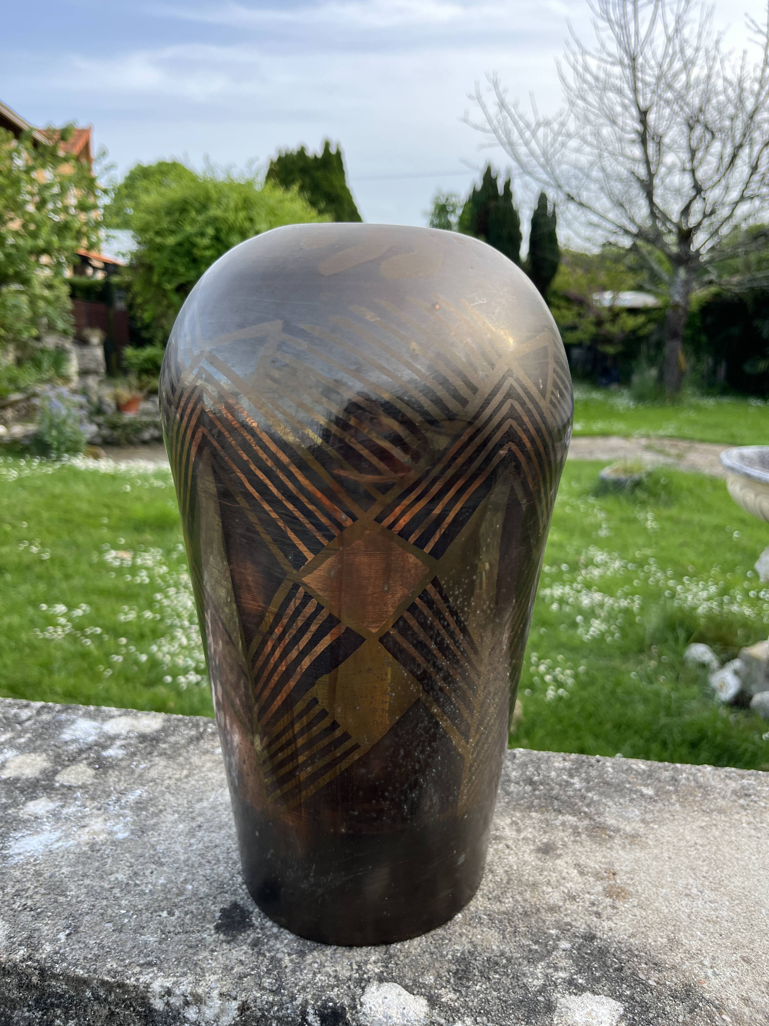 Art Deco vase in brass with geometric patterns