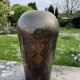 Art Deco vase in brass with geometric patterns