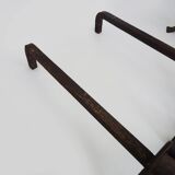 Pair of wrought iron andirons with 19th century fireplace set