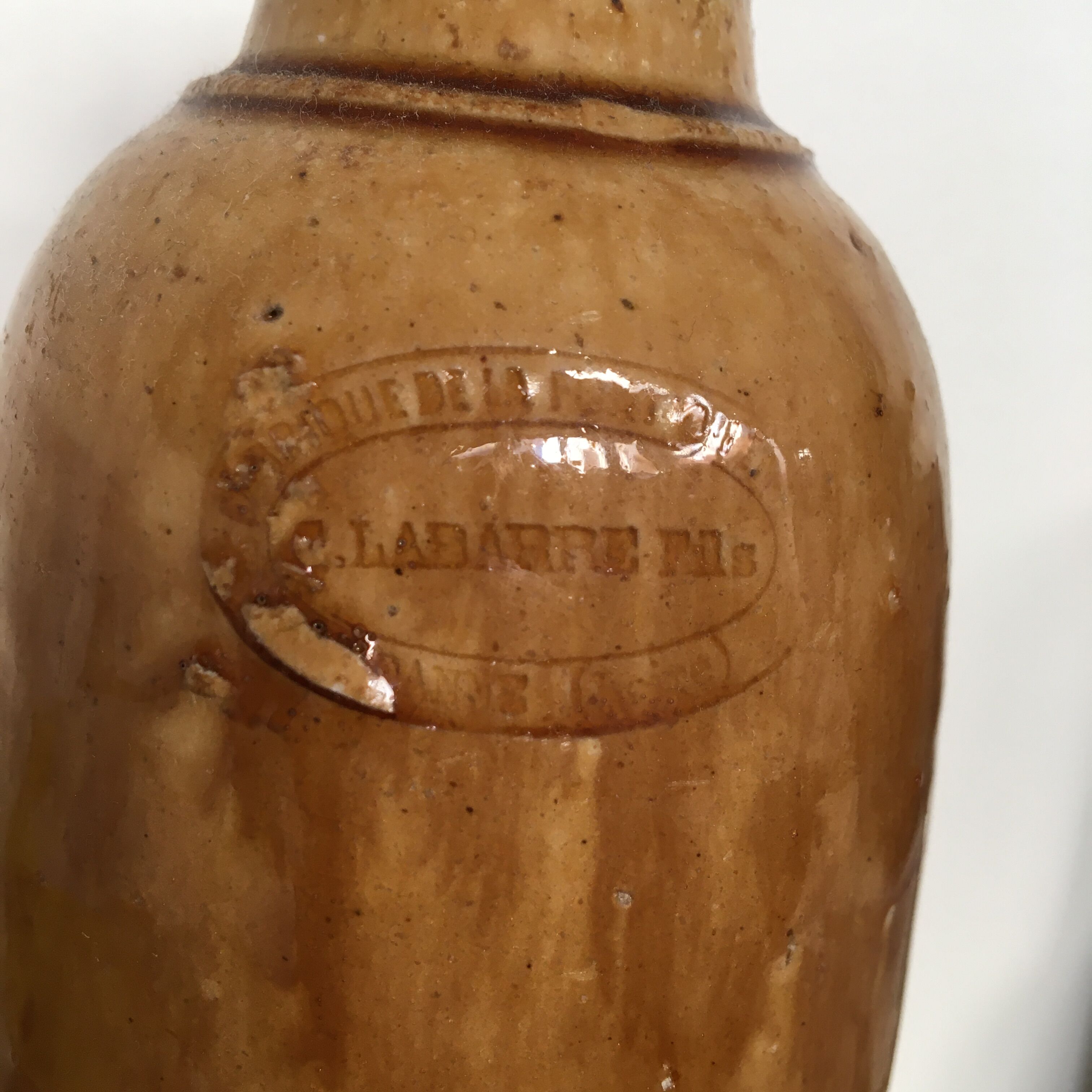 Bottle in glazed stoneware stamped labarre