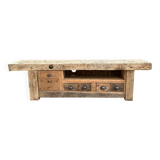 Early 20th century workbench transformed into a TV cabinet