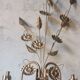 Applique murale fleurs metal doré