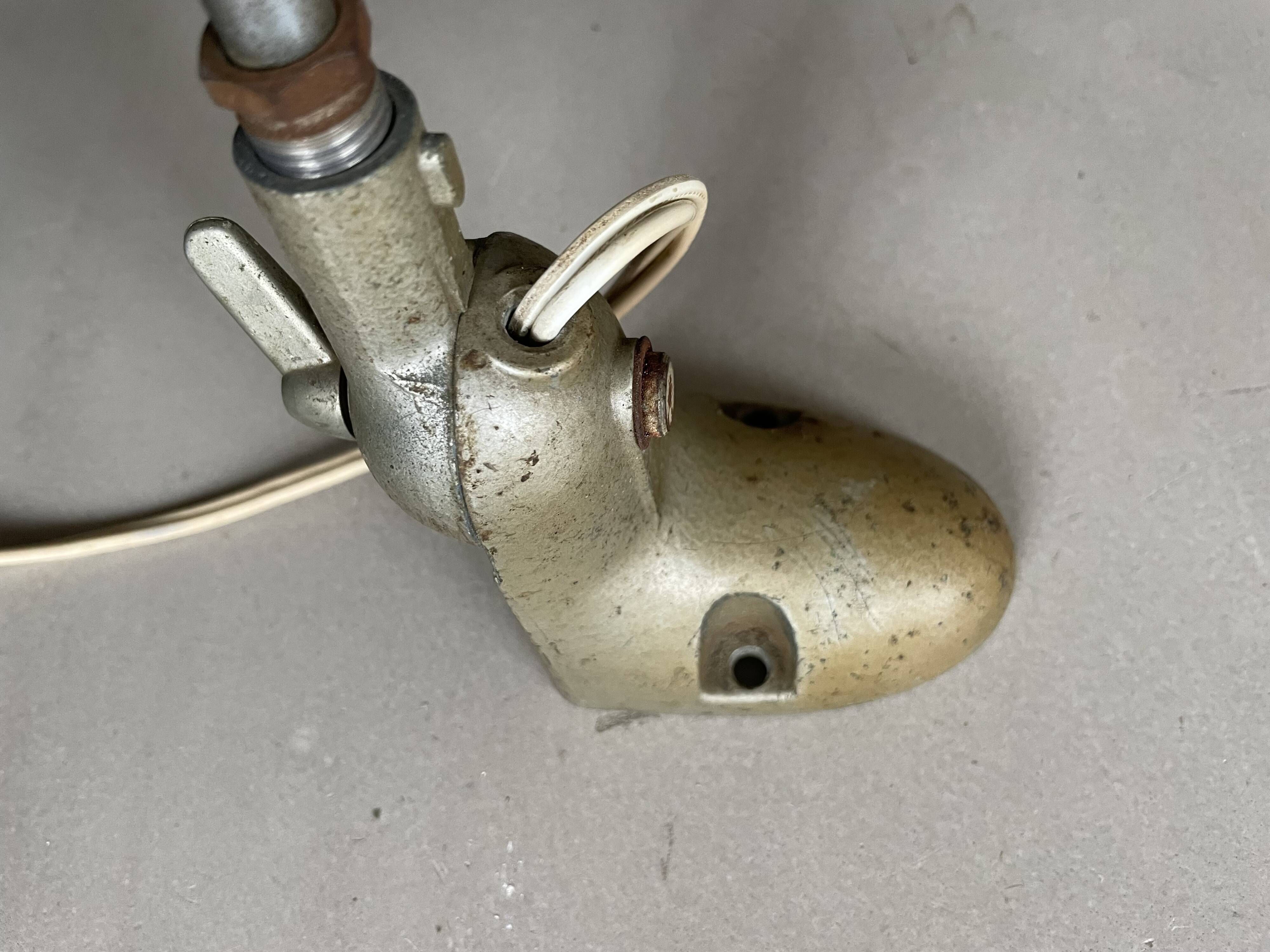 Old industrial articulated lamp