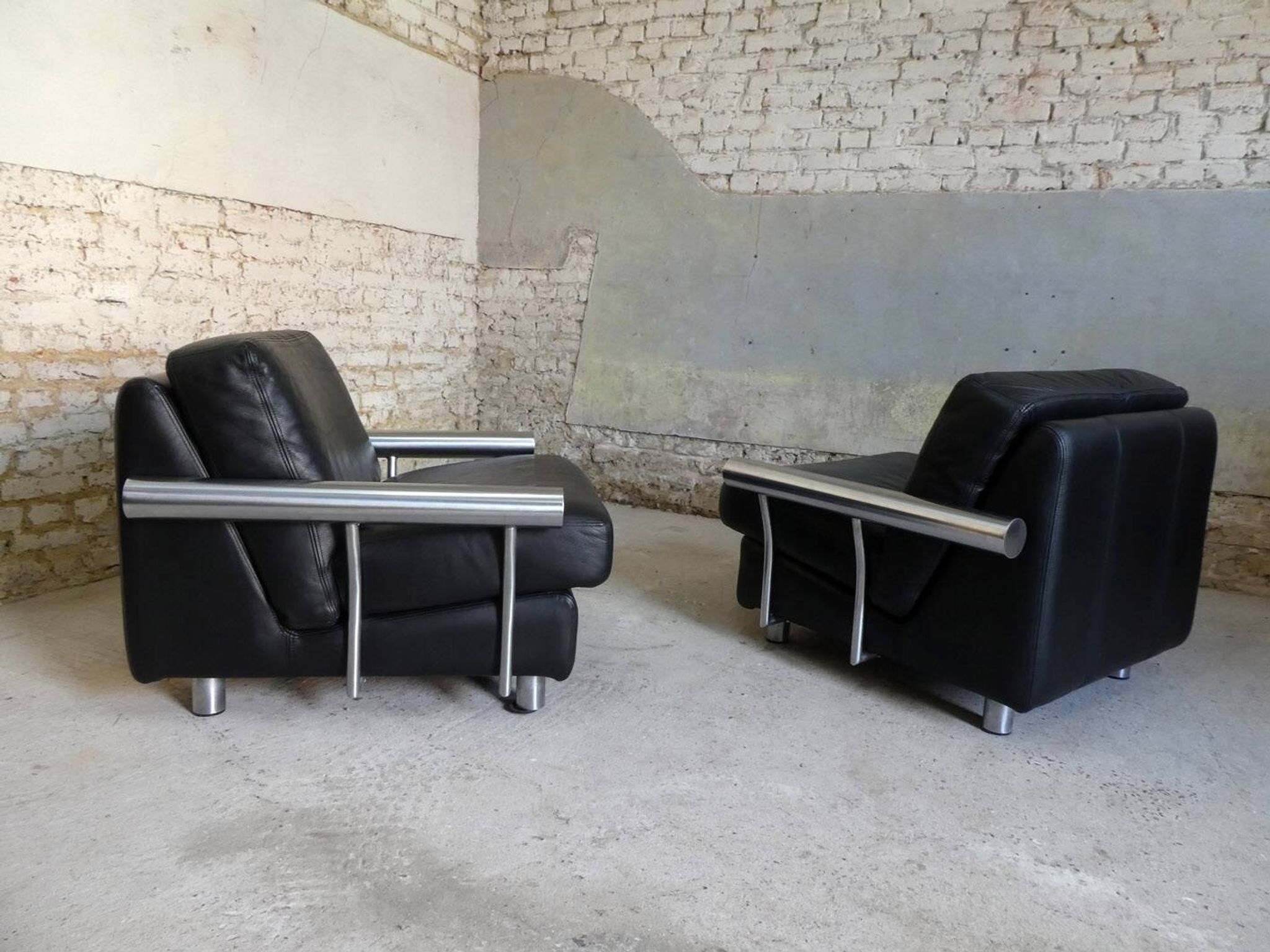 pair of armchairs, black leather & stainless steel, 1990