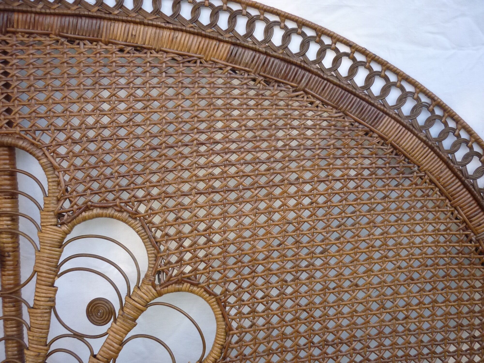 Braided and caning head of bed in wicker and rattan peacock