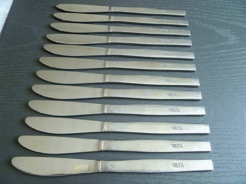 Set of 12 UTA stainless steel knives, vintage