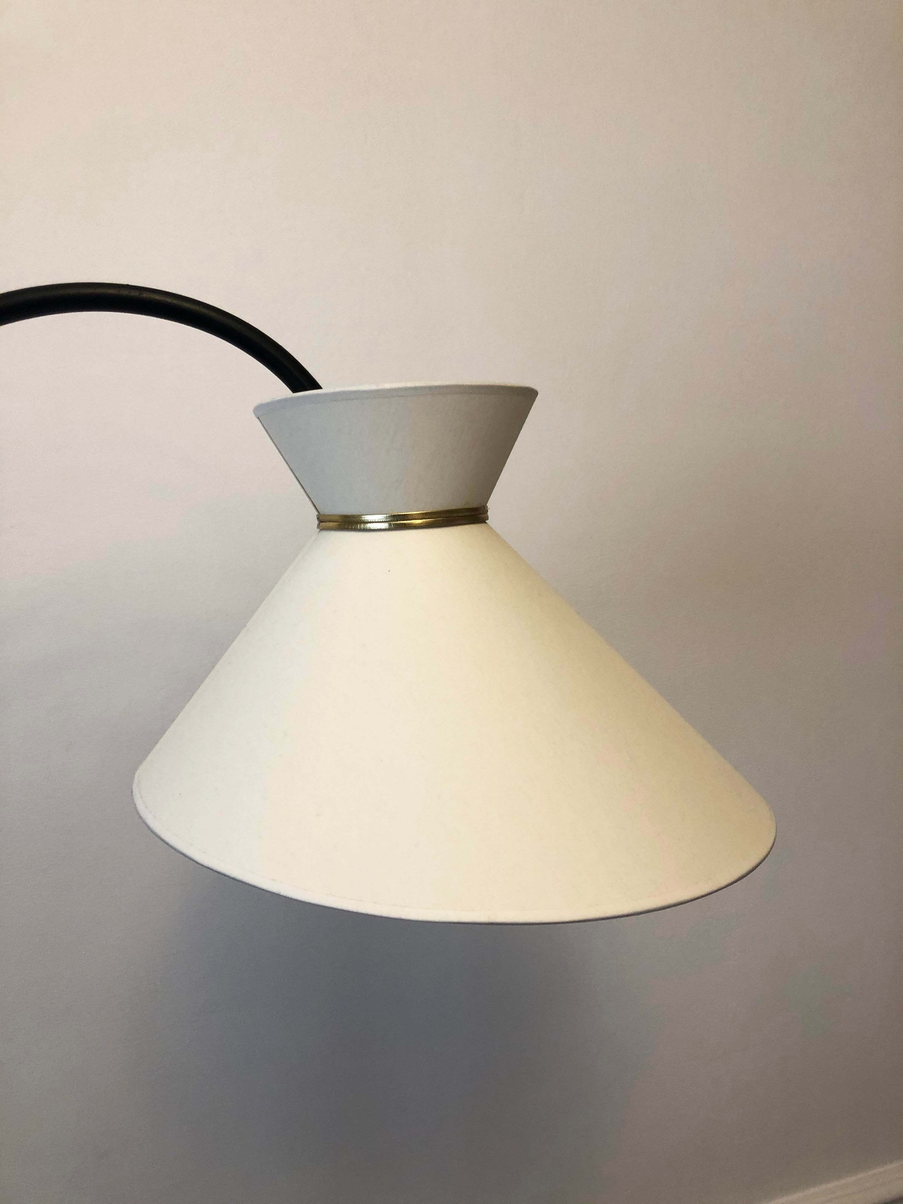 Tripod lamppost with magazine rack and defal day diabolo 1950