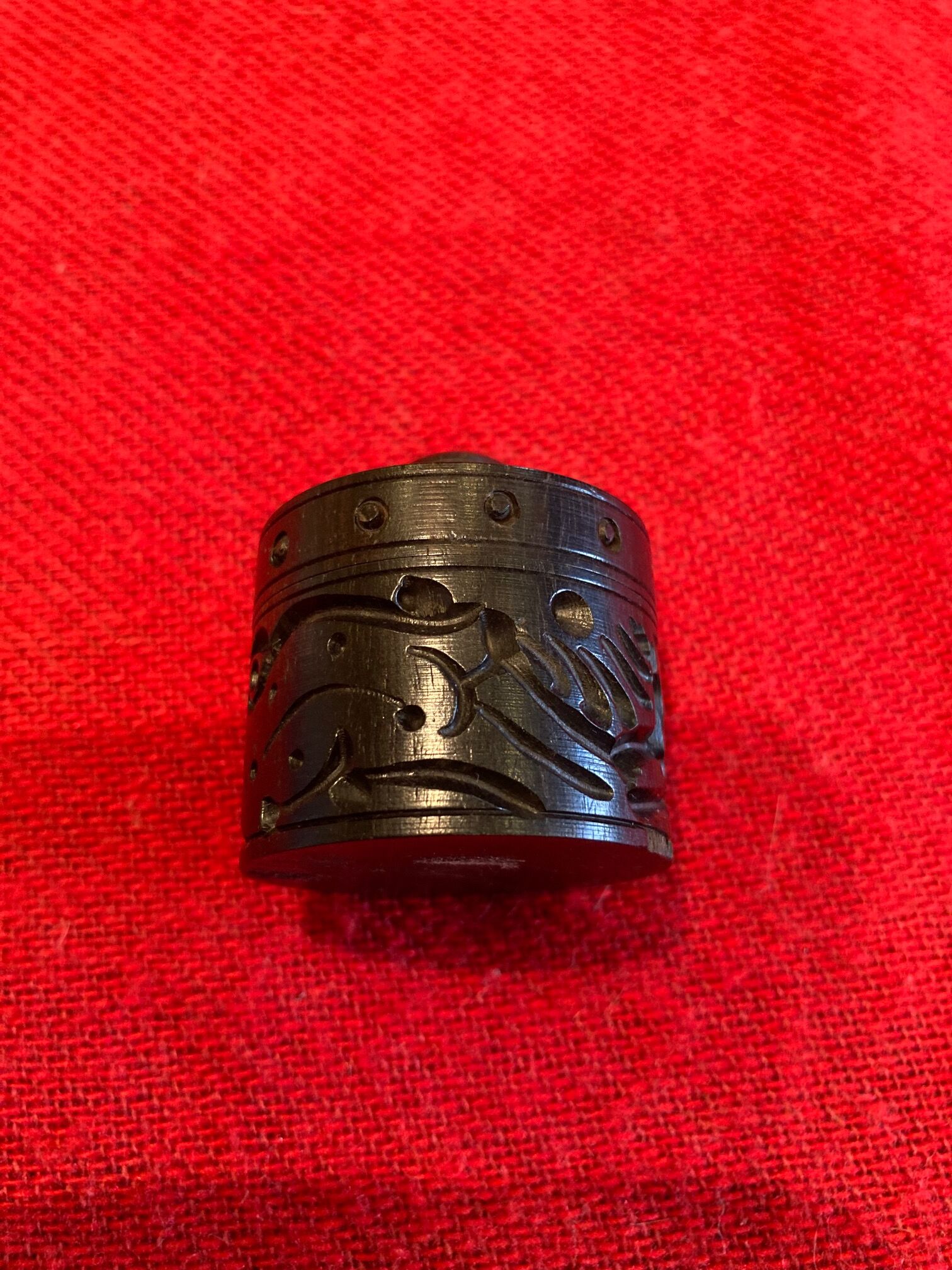 Old round box in carved ebony